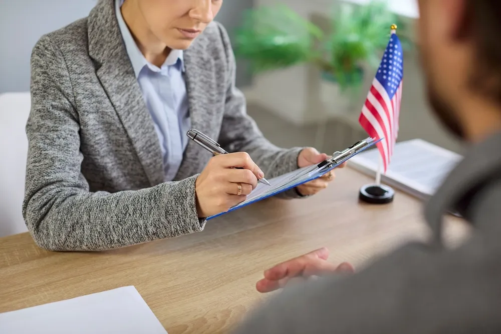 Employment-based visa applicant attending a U.S. consular interview